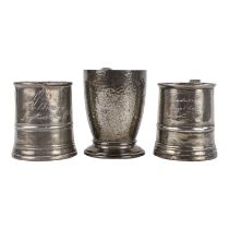 A 19th century pewter mug - of simple tapering form with a gridle, together with two further