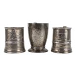 A 19th century pewter mug - of simple tapering form with a gridle, together with two further