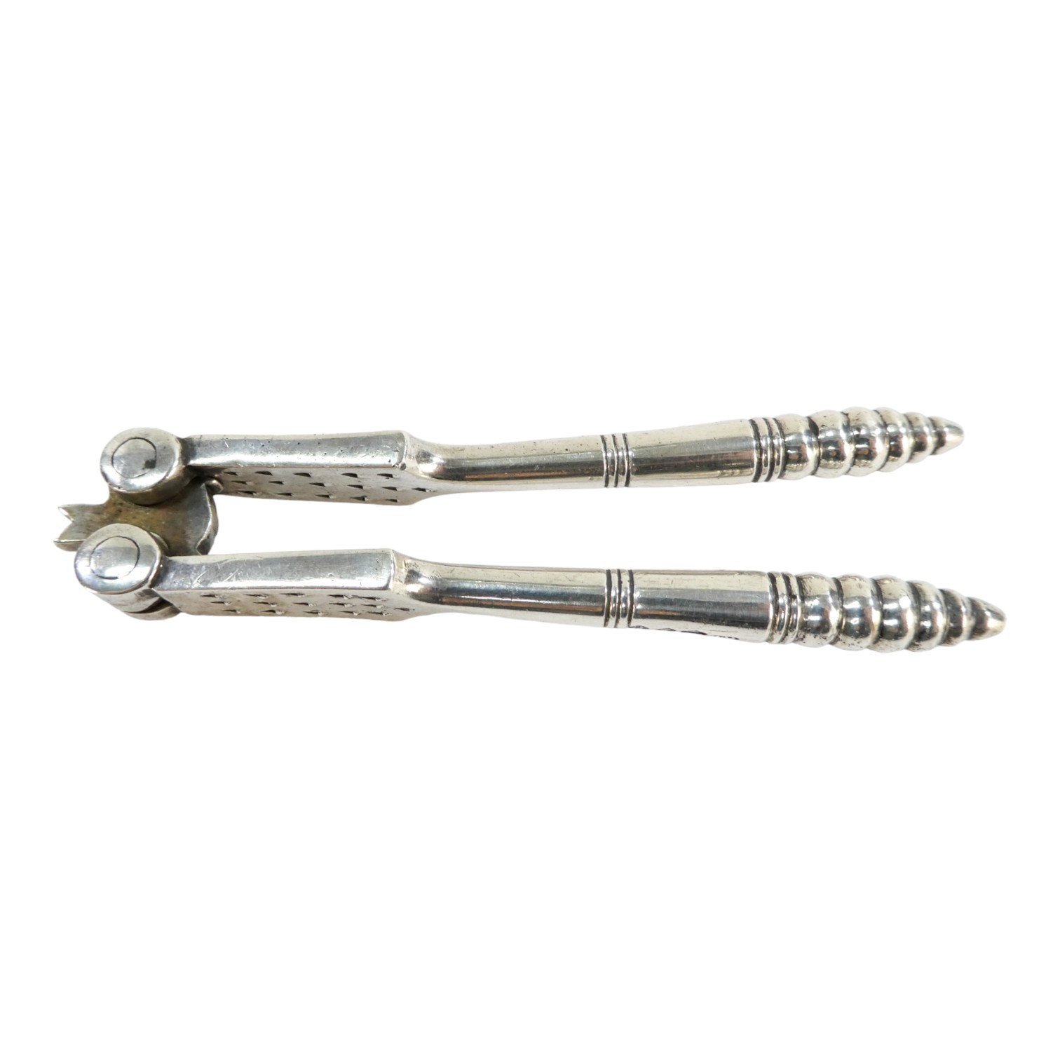 A pair of silver nut crackers - London 1892, Charles Boyton, with turned handles, weight 147g.