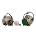Two Strand Electric cast metal theatre lights - together with an early light bulb.