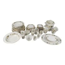 A Royal Doulton Larchmont pattern dinner service - mostly six place settings including two lidded