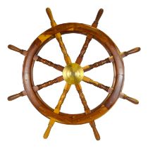 A 20th century hardwood ships wheel - with brass hub and eight turned spokes, diameter 91cm.