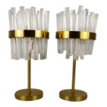 A pair of contemporary brass table lamps - the shade in the form of profiled clear acrylic shards,