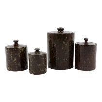 A vintage turned serpentine pot - lidded and of a cylindrical form, together with three further