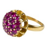 An 18ct gold ruby cluster ring - with a domed setting, size L, weight 5.7g.