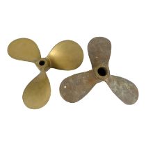 A bronze three blade boat propeller - diameter 32cm, together with another similar older example. (