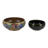 A Royal Doulton stoneware bowl - decorated with a floral band, diameter 23cm, together with