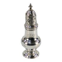 A silver castor - London 1927, Vander & Hedges, of baluster form with a pierced and engraved top,