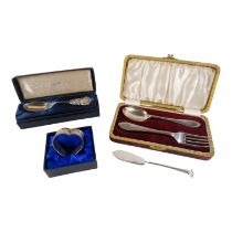 A boxed silver christening set of spoon and fork - Sheffield 1927, together with a heart shaped