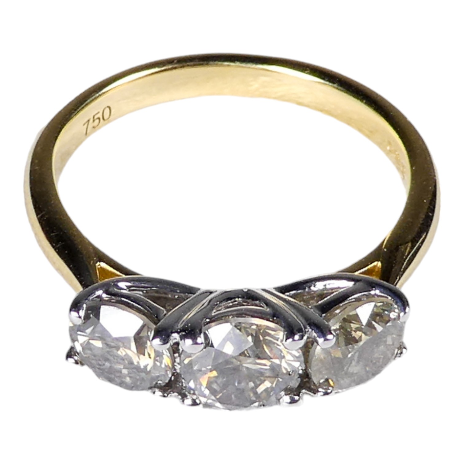 An 18ct white and yellow gold circular brilliant cut three stone diamond ring - diamond weight 1.