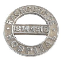 A silver badge for the Racecourse Hospital 1914-1918 - of open circular form with a date bar to