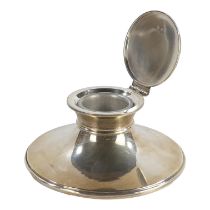 A silver capstan type inkwell - London 1923, Charles Boyton & Son Ltd, diameter 15cm.