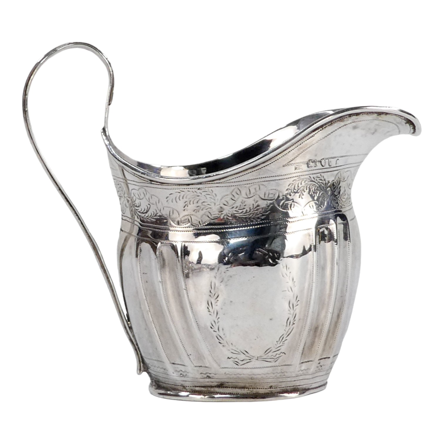 A Georgian silver cream jug - Newcastle, marks indistinct, fluted with engraved foliate bands, - Image 2 of 5
