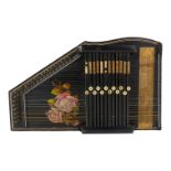 An early 20th century zither - black and decorated with a rose.