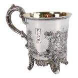 A silver christening mug - London 1840, repousse decorated with figures in a Chinese landscape, gilt