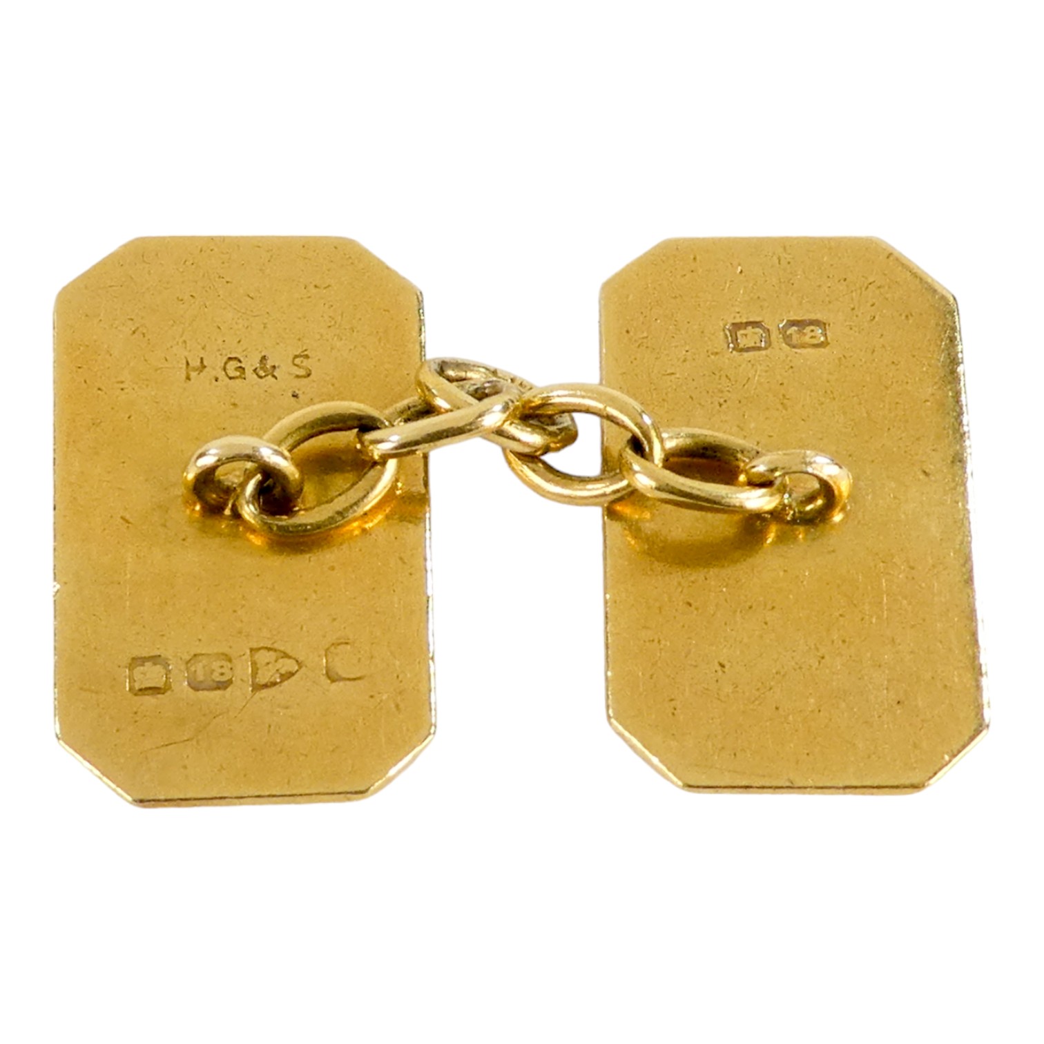 A pair of 18ct gold cufflinks - rectangular with canted corners, engine turned with a 'white' - Image 2 of 2