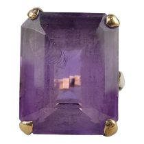 A 9ct gold amethyst ring - with an emerald cut stone, size P, weight 7.6g.