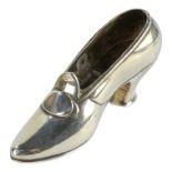 A silver pin cushion in the form of a shoe - Birmingham, lacking upholstered pad, weight 19g.