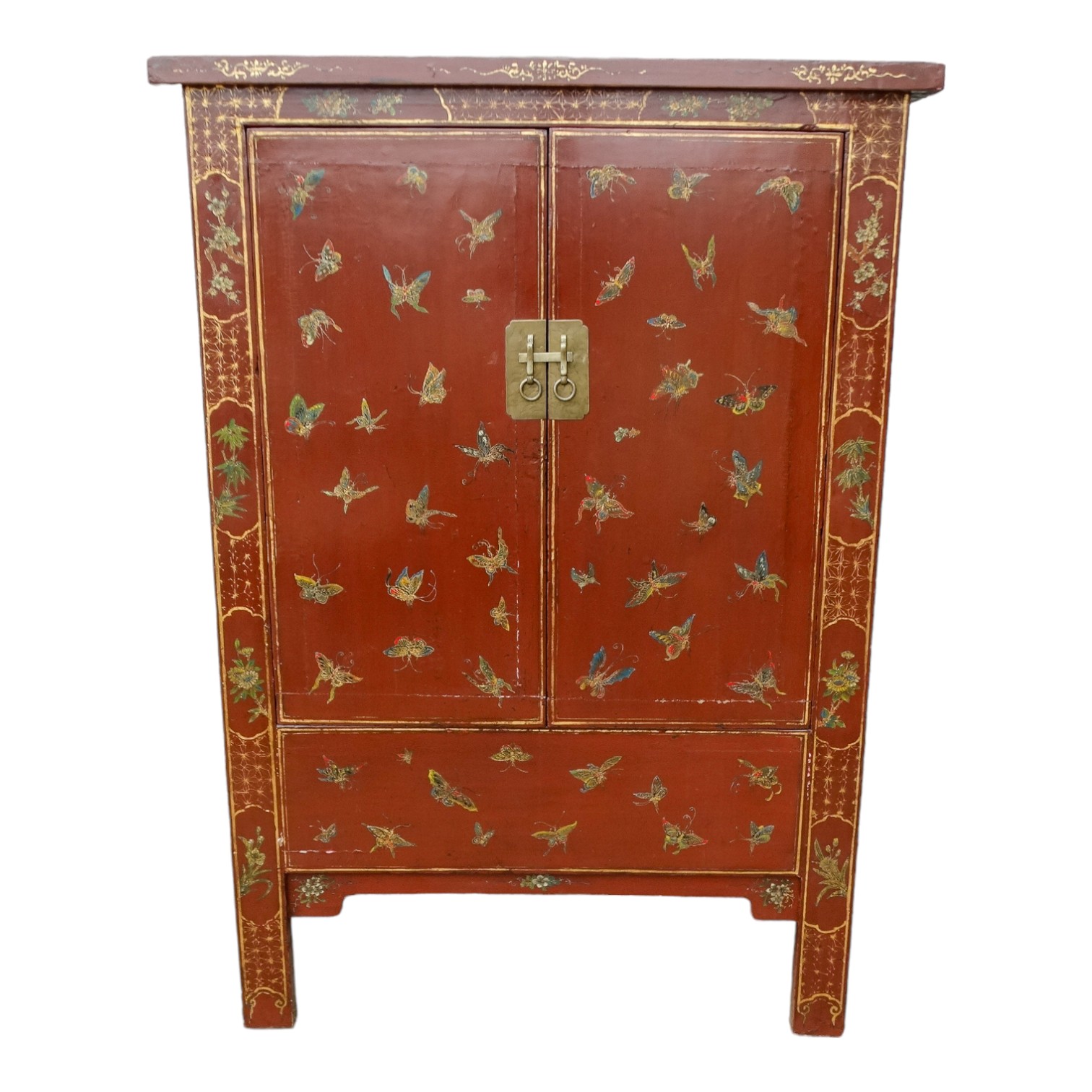 A 19th century Chinese lacquered cabinet - decorated with butterflies and cherry blossom, the pair