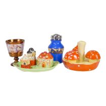 A Carlton Ware cruet set - modelled as a mushroom, together with another 'village' cruet set, a