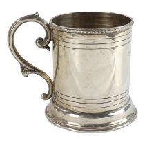 A silver christening mug - Birmingham 1903, T H Hazlewood & Co, with a rope-twist rim and raised