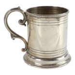 A silver christening mug - Birmingham 1903, T H Hazlewood & Co, with a rope-twist rim and raised