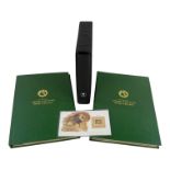 Two World Wildlife Fund stamp albums - together with another similar album.