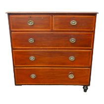 A late 19th century mahogany chest of drawers by Waring - the rectangular moulded top above an