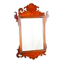 A George III style mahogany fretwork wall mirror - with a rectangular plate, height 70cm.