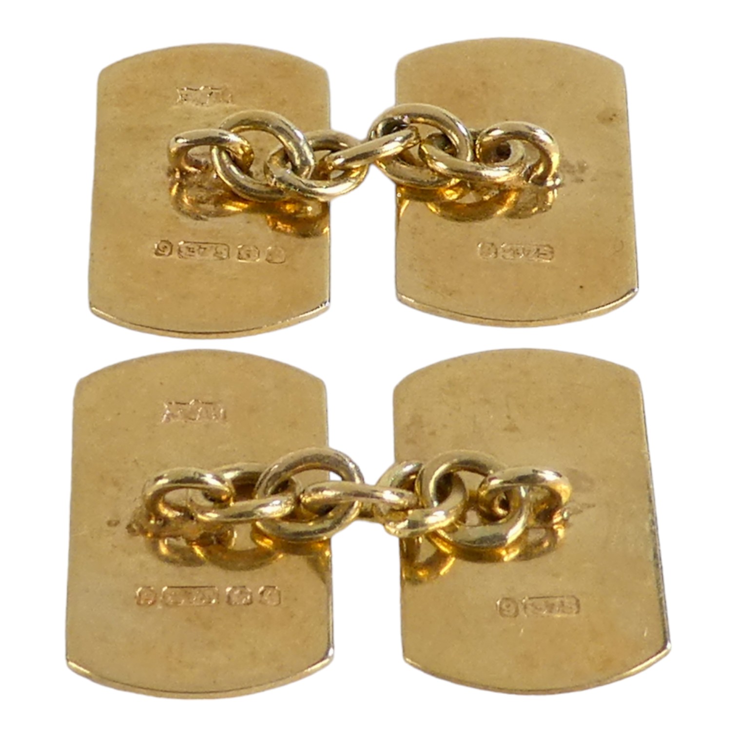 A pair of 9ct gold cufflinks - of rounded rectangular form, with engine turning, weight 4g. - Image 2 of 3