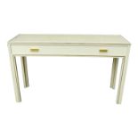 A Pierre Vandel, Paris cream console table - the rectangular top with gilt lining above a frieze