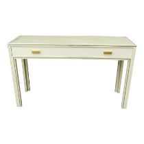 A Pierre Vandel, Paris cream console table - the rectangular top with gilt lining above a frieze