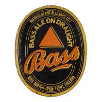 A 20th century enamel Bass brewer's sign - oval, in traditional font and with red triangle trade