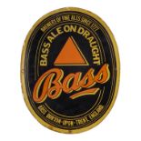 A 20th century enamel Bass brewer's sign - oval, in traditional font and with red triangle trade