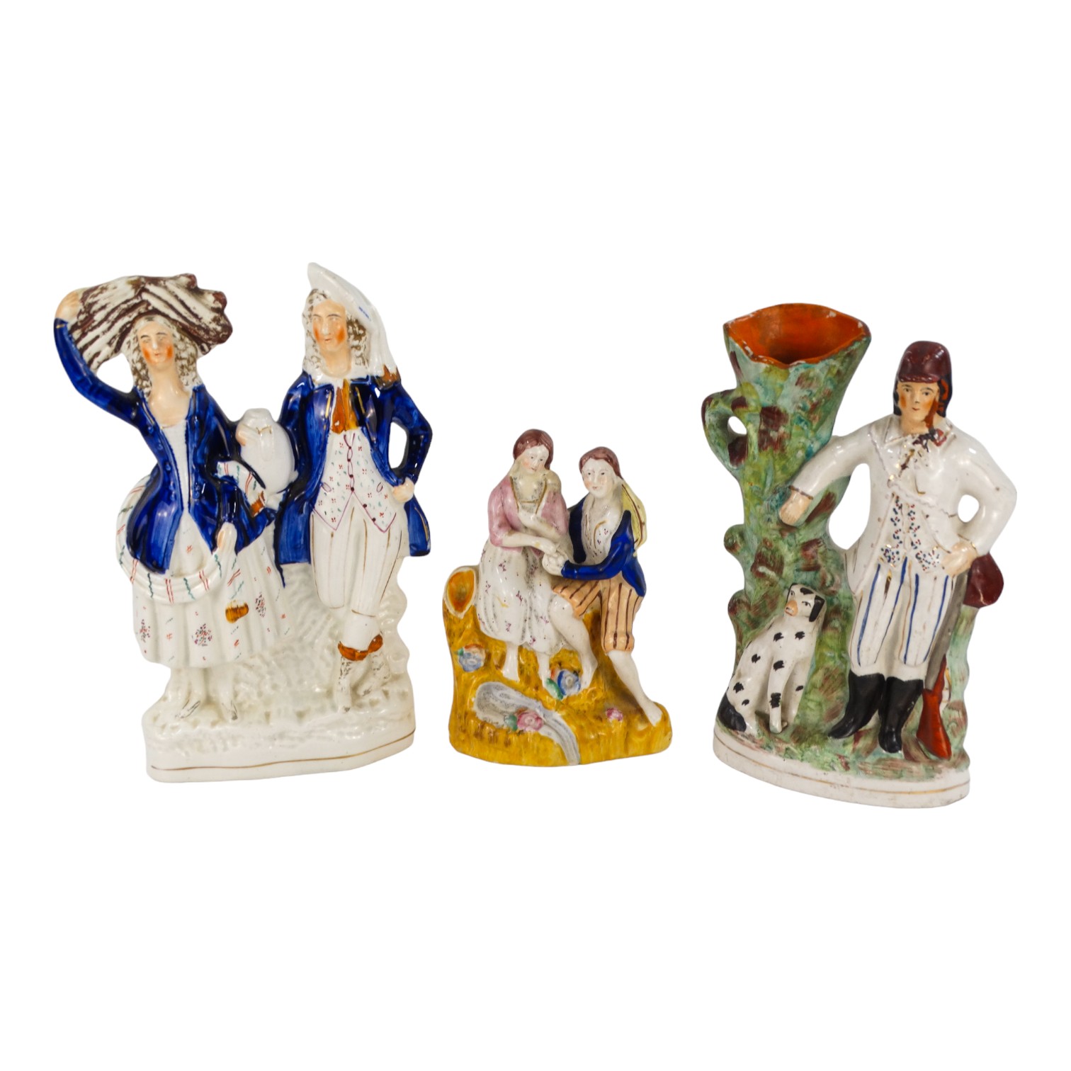 A 19th century Staffordshire figure group - holding a sheaf of corn and a water jar, height 31cm,