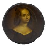 A 19th century papier mache circular box - decorated with a portrait of an elegant lady,