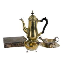 A 20th century silver plated coffee pot - with ebonised handle, together with a small quantity of