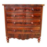 A Victorian mahogany bowfront chest of drawers - with an arrangement of two short and three long