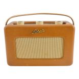 A 1960's Roberts radio - model R200, with sand coloured cloth case, width 23cm.