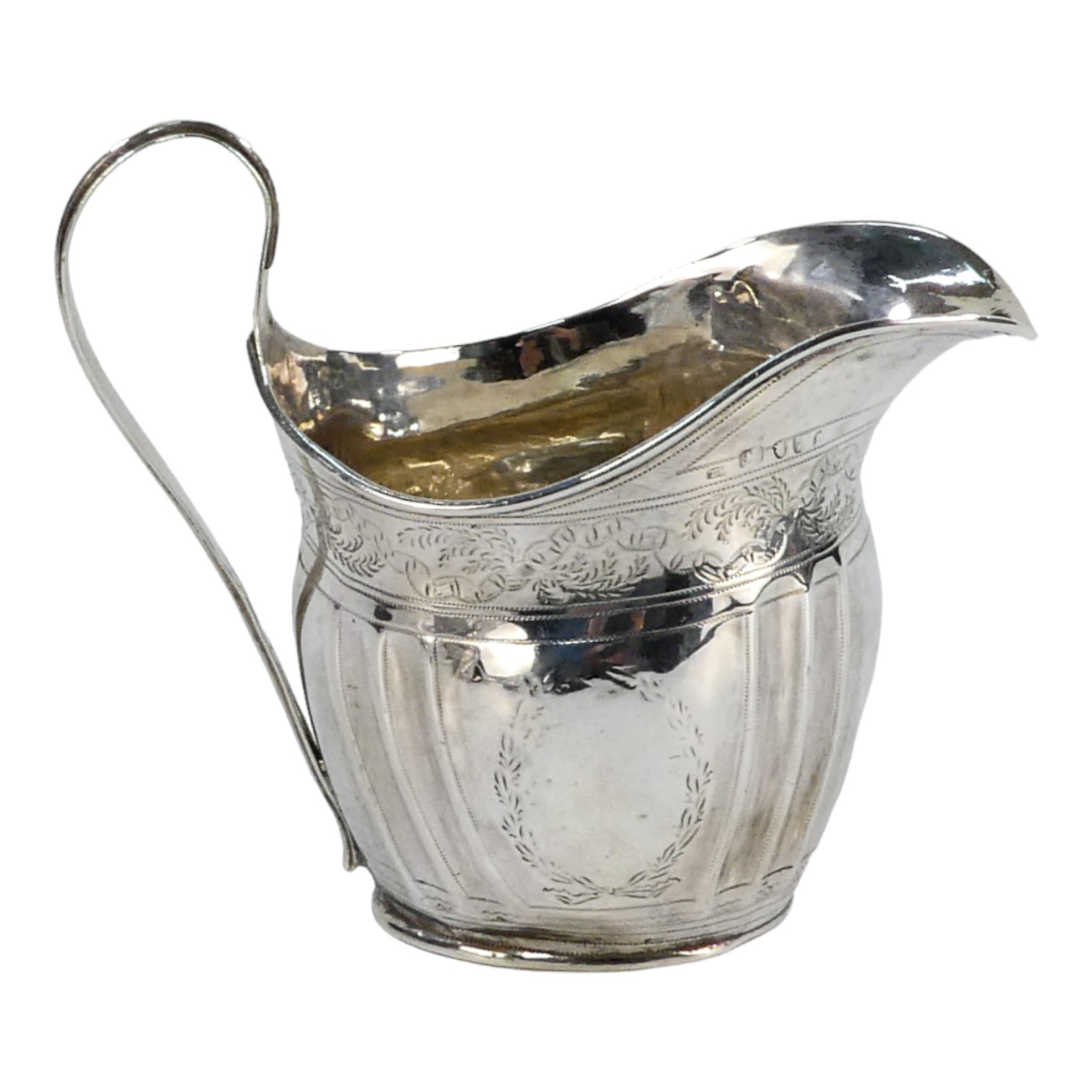 A Georgian silver cream jug - Newcastle, marks indistinct, fluted with engraved foliate bands, - Image 3 of 5