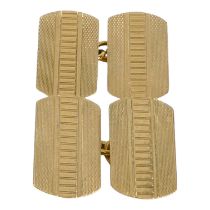 A pair of 9ct gold cufflinks - of rounded rectangular form, with engine turning, weight 4g.