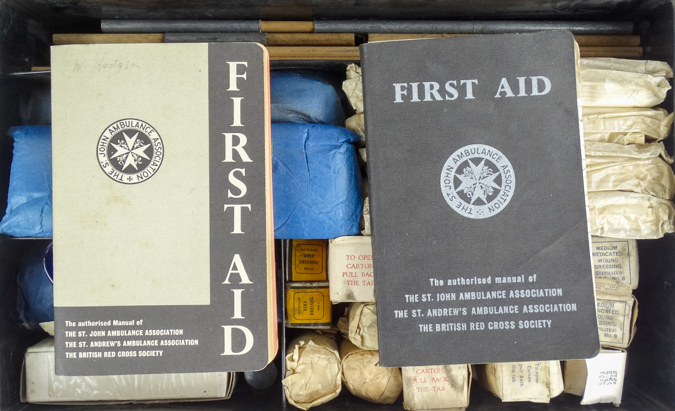 A St John Ambulance First Aid box - the black steel trunk with contents, including splints and - Image 3 of 6