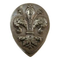 A white metal clip by A G. Accarisi Firenze - cast fleur-de-lis decoration, stamped verso, weight