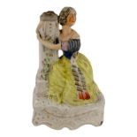 A 19th century Staffordshire figure of Jenny Lind - as the character Alice in one of Giacomo