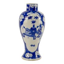 A late 19th century Chinese blue and white baluster vase - decorated with still life vignettes