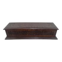 An early 20th century oak glove box - rectangular and carved with oak leaves and flower heads, width