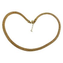 A vermeil necklace - of a woven design with claw fastener, length 45cm, weight 24g.