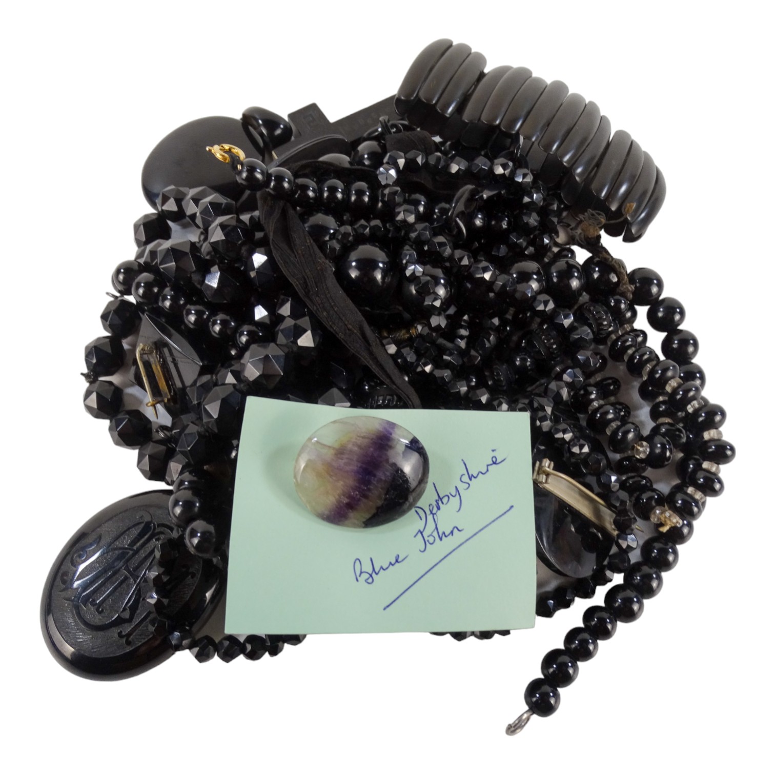 A small quantity of Whitby jet - including an oval locket, various bead necklaces and carved - Image 2 of 2