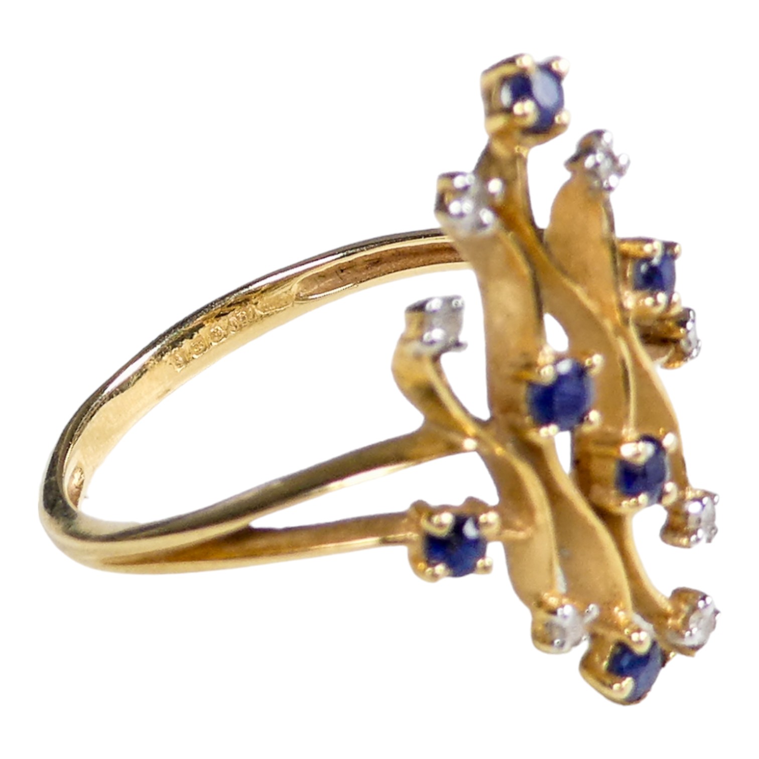 A diamond and sapphire dress ring - with an unusual setting, size N, weight 2.3g. - Image 3 of 3