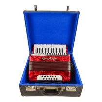 A vintage piano accordion by Galotta - 12 bass, with a red pearl case, boxed.